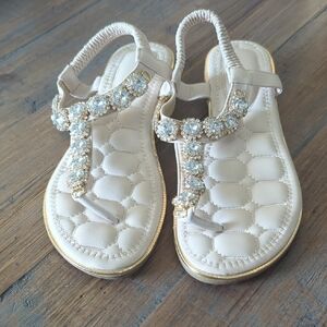 Elegant Cream Sandals with Gold Accents